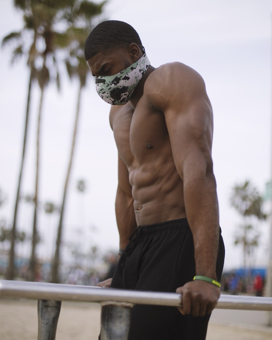 Calvin on the dip bars