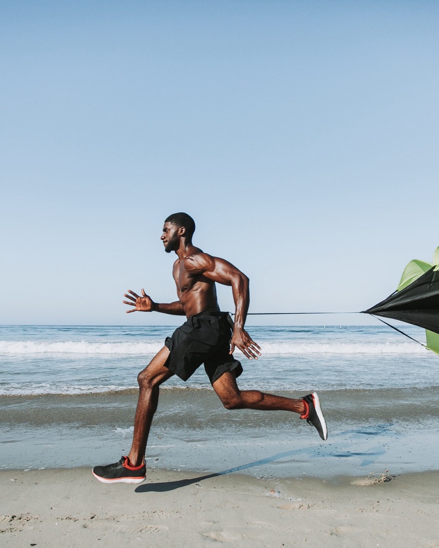 Calvin running with a speed chute